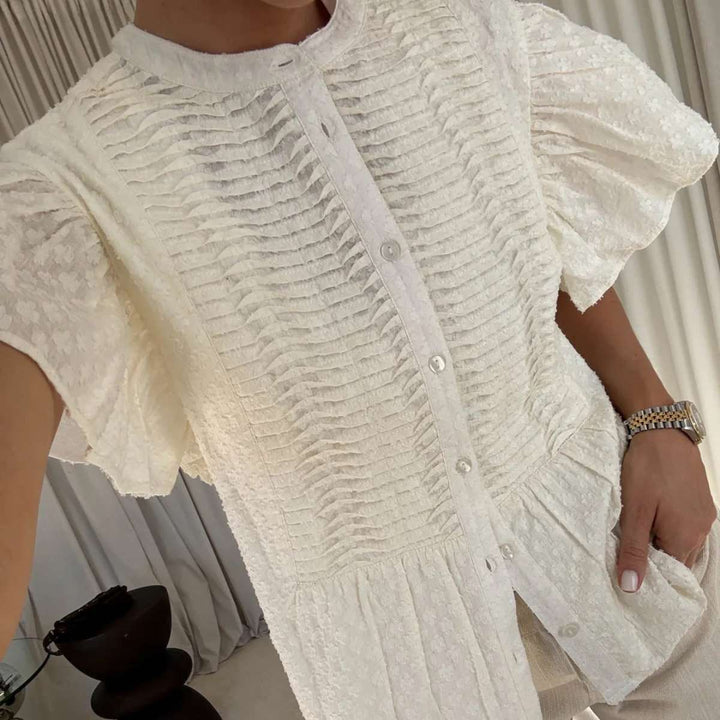 Noella N-Loulou White